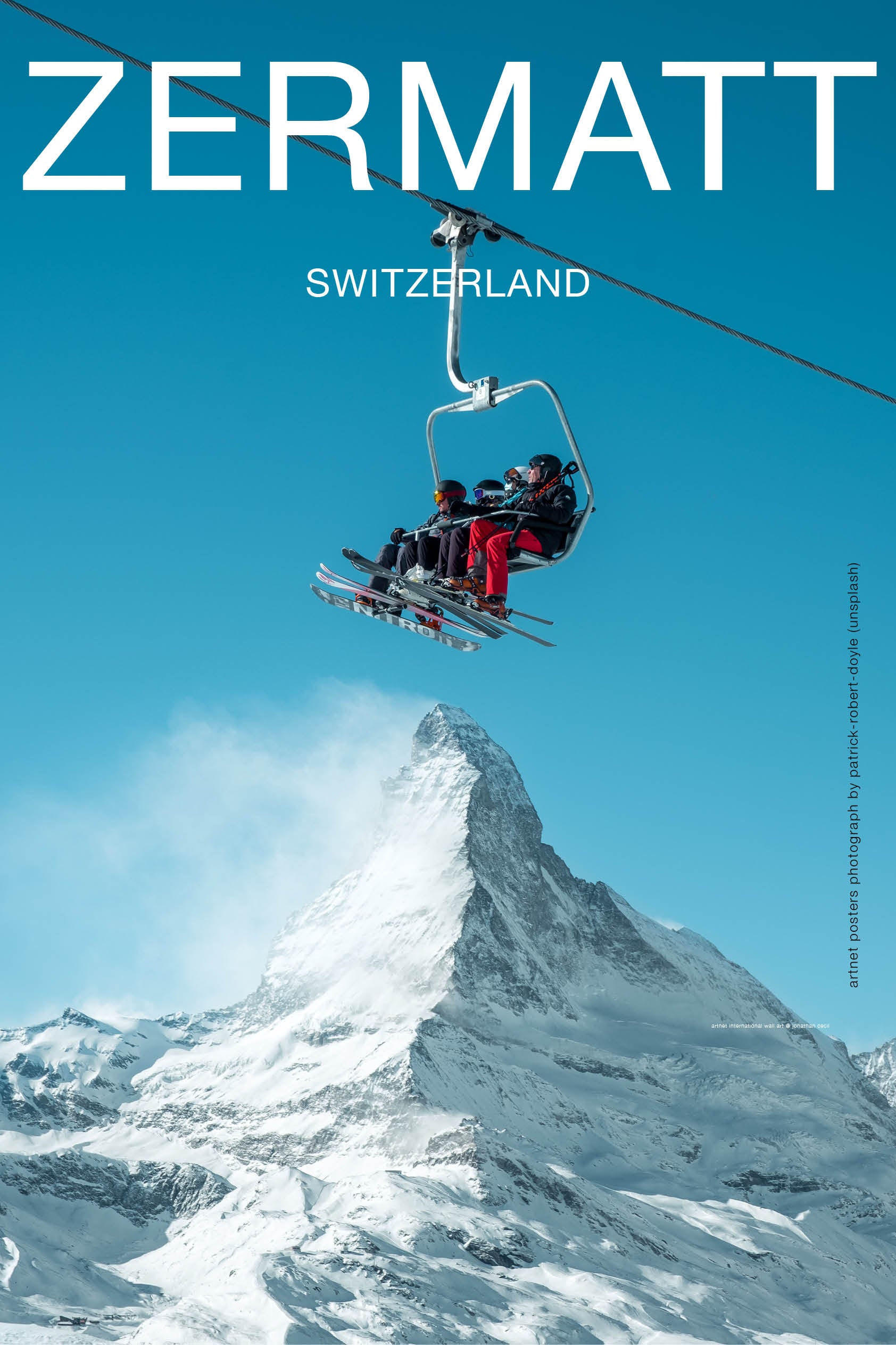 Skiing on top of the Matterhorn poster